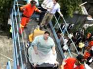 ഭാരം 300കിലോ 40കാരിയെ ഉയര്‍ത്താന്‍ ക്രെയിന്‍