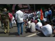 തോമസ് ചാണ്ടിയുടെ രാജി: കോഴിക്കോട് നഗരത്തില്‍ തെരുവുയുദ്ധം