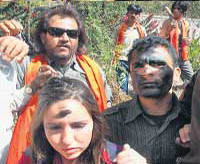 Saffron brigade smears black paint on another couple 