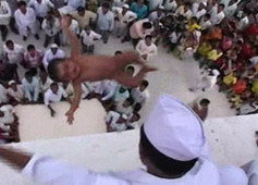 The infants are thrown off the roof of the Baba Sheikh Umar Saheb Dargah