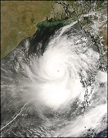 This image provided by NASA's MODIS instrument on board the Terra satellite shows Cyclone Nargis as it approaches the coast of Bangladesh Thursday May 1, 2008. The cyclone brewing in the Bay of Bengal was expected to hit the south coast of Bangladesh late Friday with maximum significant wave heights of 21 feet before heading to Myanmar. At 08:00 GMT Friday May 2, 2008 Tropical Cyclone Nargis had sustained winds of 185 kilometers (115 miles) an hour, gusting to 230 kilometers (143 miles) per hour as it approached the coast of Myanmar, according to the U.S. Navy Joint Typhoon Warning Center.