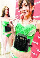 A model displays the 'Photovoltaic-Powered Bra