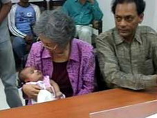 Manji with Father and Grandma