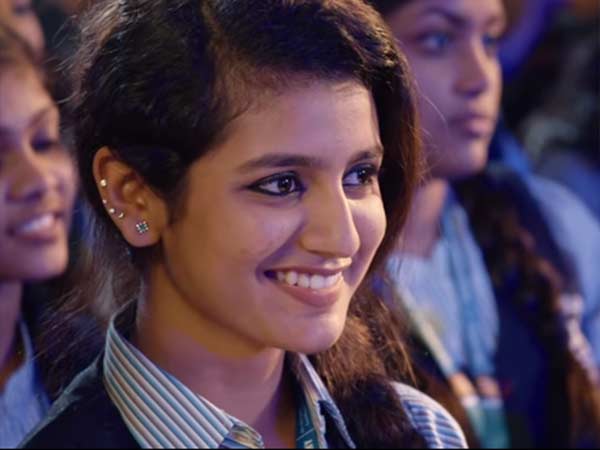 മാണിക്യമലരും കണ്ണിറുക്കലും